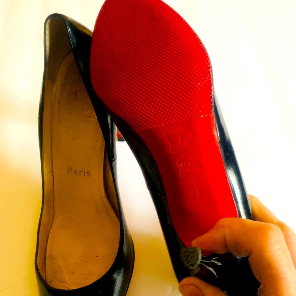 Christian Louboutin black peep toe pumps size 38. (7.5) 3.75 heel.
